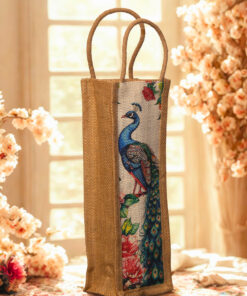 A tall, narrow jute bag with an illustrated peacock and floral design on the front.