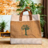 Jute tote bag with a green tree graphic in the center