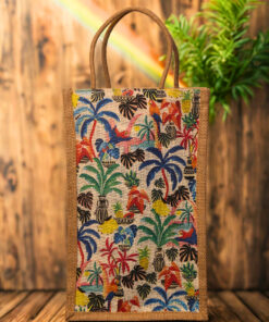 A medium-sized rectangular jute bag featuring a vibrant and detailed tropical print with palm trees, birds, and flowers.