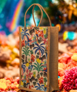 A medium-sized rectangular jute bag featuring a vibrant and detailed tropical print with palm trees, birds, and flowers.