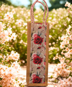 Jute bottle bag with floral print fabric panel and red-and-white rope handles.