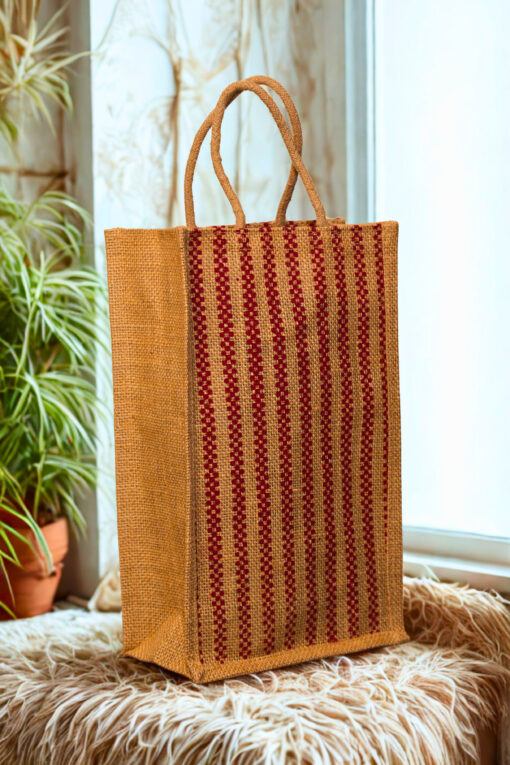 A medium-sized rectangular jute bag with a woven pattern of alternating natural jute and red vertical stripes.