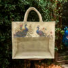 Canvas gift bag with printed peacock design and transparent front panel