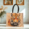 Canvas tote bag featuring a realistic and fierce tiger face illustration