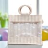 Natural jute gift bag with beige stripes and a transparent front window.