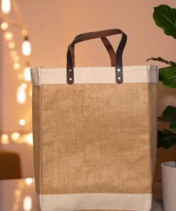 A rectangular tote bag featuring a natural brown textured (likely jute) body