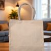 Plain beige canvas tote bag with short handles