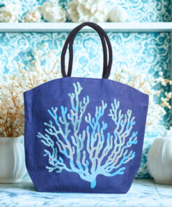 Natural jute tote bag with a large dark blue coral design on the front