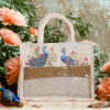 Elegant canvas bag with dual peacock print design and transparent front window