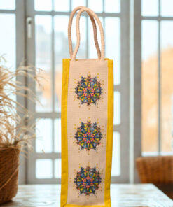 Eco-friendly canvas bottle bag featuring vibrant mandala designs and a yellow fabric border with white rope handle.