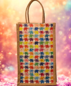A medium-sized rectangular jute bag featuring a repeating grid pattern of small, colorful elephants.