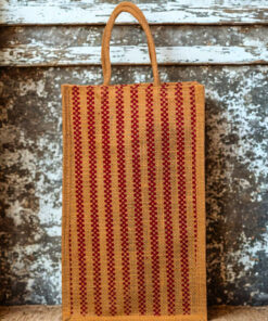 A medium-sized rectangular jute bag with a woven pattern of alternating natural jute and red vertical stripes.