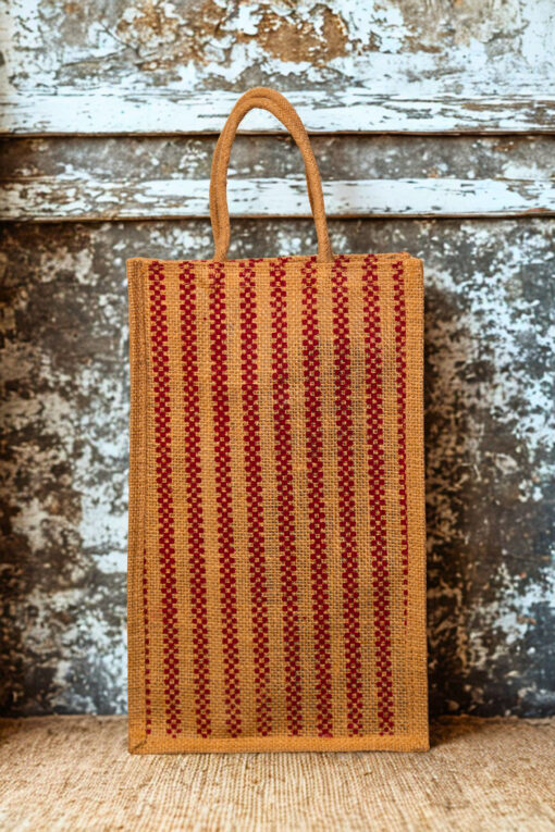 A medium-sized rectangular jute bag with a woven pattern of alternating natural jute and red vertical stripes.